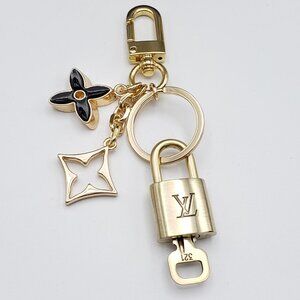 Authentic Louis Vuitton Lock & Key with Unbranded Flower Charm, Keychain